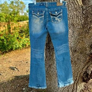 Vtg.Y2K Amethyst bling low rise flare blue jeans with crochet pockets.Size 13